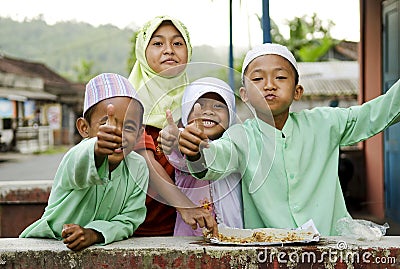 Smiling muslim children in bali indonesia Editorial Stock Photo