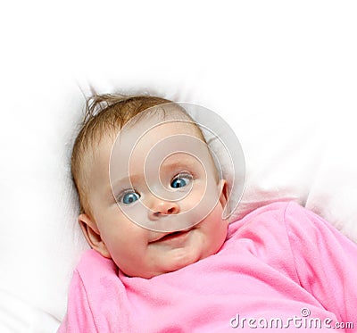 Smiling newborn baby girl Stock Photo