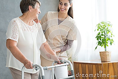 Old lady with walker Stock Photo