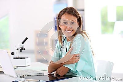 Smiling nurse working at hospital Stock Photo