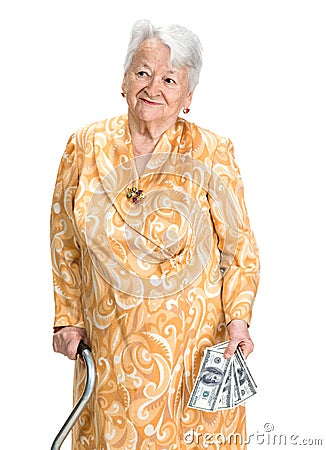 Smiling old woman holding money in hands Stock Photo