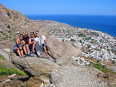 Smiling people, Greece, Santorini, selfie, top view of Kamari beach Editorial Stock Photo