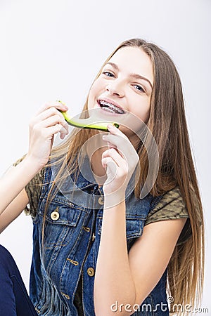 Smiling Positive Caucasian Teenage Girl With Teeth Braces Stock Photo