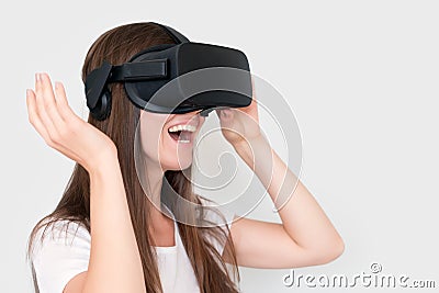 Smiling positive woman wearing virtual reality goggles headset, vr box. Connection, technology, new generation, progress Stock Photo