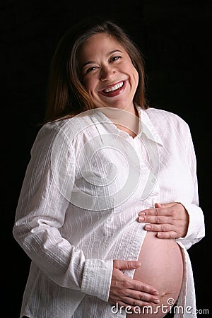 Smiling pregnant woman Stock Photo