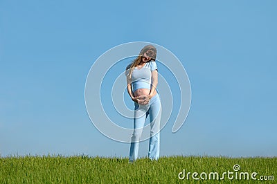 Smiling pregnant woman Stock Photo