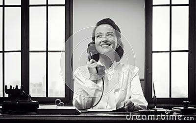 Smiling receptionist at work Stock Photo