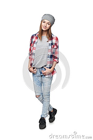 Smiling relaxed teen girl standing in full length Stock Photo