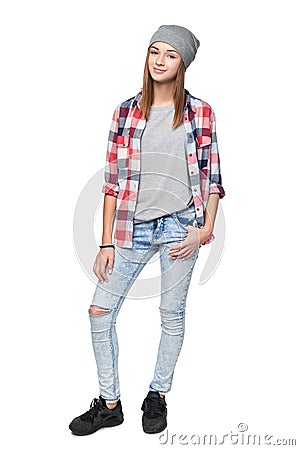 Smiling relaxed teen girl standing in full length Stock Photo