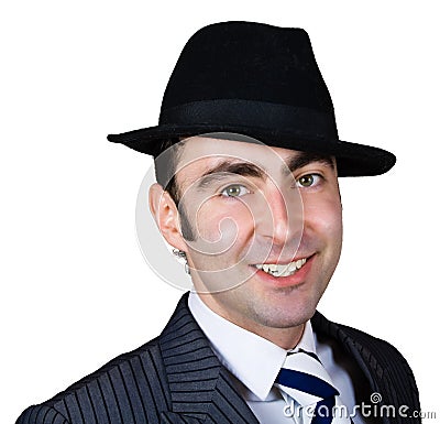Smiling retro businessman in hat Stock Photo