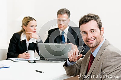 Smiling satisfied businessman Stock Photo