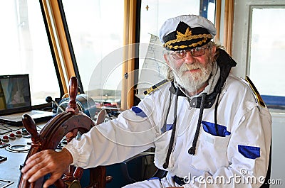Smiling, satisfied captain, bon voyage Stock Photo