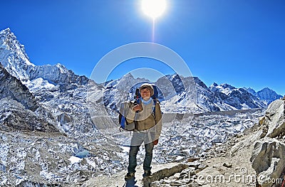 Smiling Sherpa trekking guide poses for a photo , way to Everest base camp Editorial Stock Photo