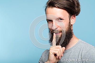 Smiling smug man secret confidential business tips Stock Photo