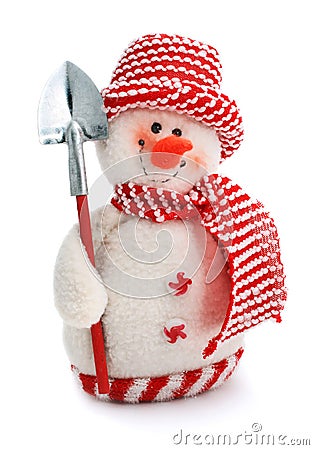 Smiling snowman toy dressed in scarf and cap Stock Photo