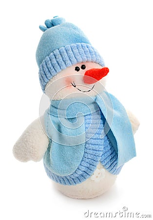 Smiling snowman toy dressed in scarf and cap Stock Photo