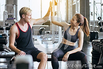 Smiling sporty couple attractive and clap or join hands together,Hand coordination of people motivated,Happy and fun Stock Photo