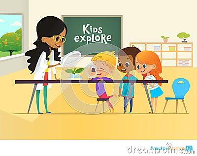 Smiling teacher and children looking through magnifying glass at green sprout during biology lesson in classroom Vector Illustration