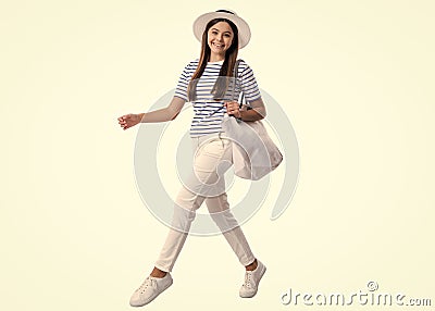 smiling teen girl in marine style at studio. teen girl in marine style on background. Stock Photo