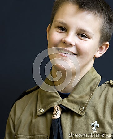 Smiling teenage boyscout Stock Photo