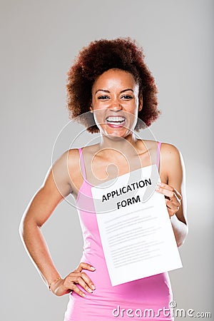 Smiling woman with an application form Stock Photo