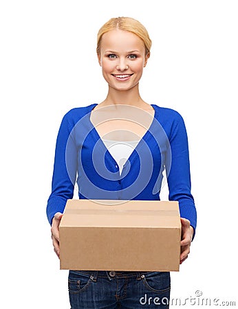 Smiling woman in casual clothes with parcel box Stock Photo