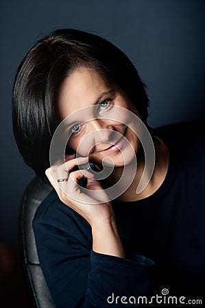 Smiling woman with mobile Stock Photo