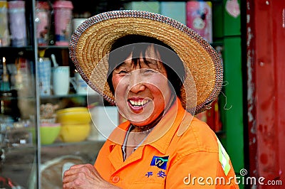 Pixian Old Town, China: Woman Wearing Straw Hat Editorial Stock Photo