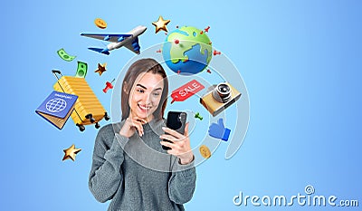 Smiling woman with smartphone order tickets online and buy holid Stock Photo