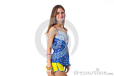 Smiling woman standing sidewise Stock Photo