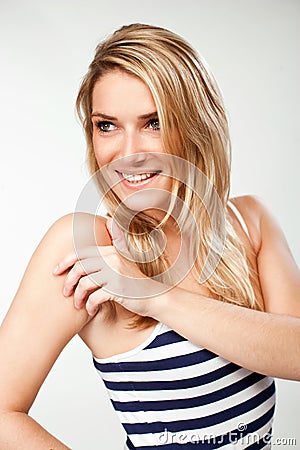 Smiling Woman in Stripe Sleeveless Shirt Stock Photo