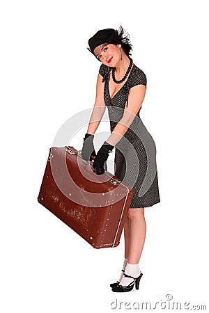Smiling woman with a suitcase Stock Photo