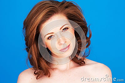 Smiling Woman With Tilted Head Stock Photo