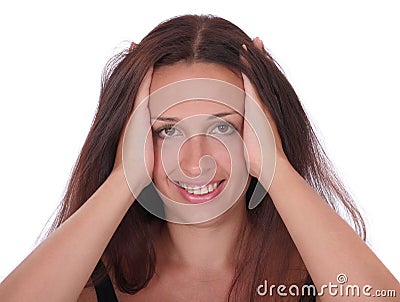 Smiling woman touching head Stock Photo