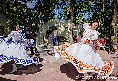 Smiling Women, Twirling Ribbon Skirts Flying - Puerto Vallarta, Editorial Stock Photo