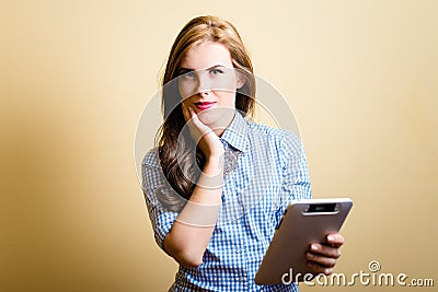 Smiling young amazing female with tablet pc Stock Photo