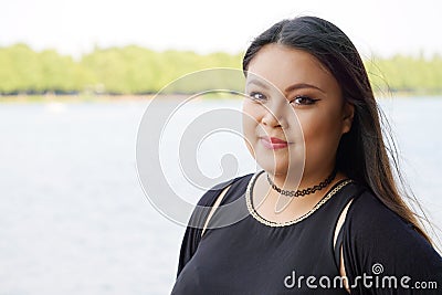 Smiling young asian woman Stock Photo