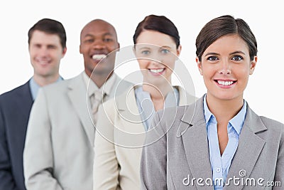 Smiling young businessteam standing Stock Photo