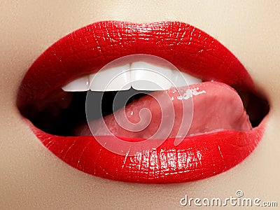 Smiling young girl. Beauty face closeup. lips. Beauty red lip makeup detail Stock Photo