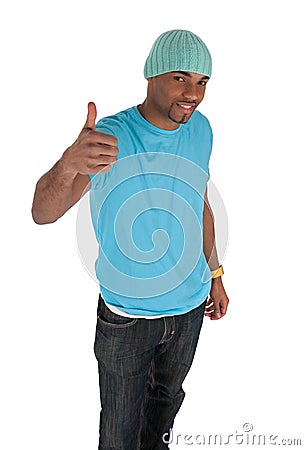 Smiling young man in a blue with thumb up Stock Photo