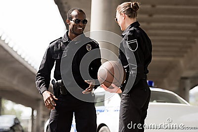 smiling young police officers Stock Photo