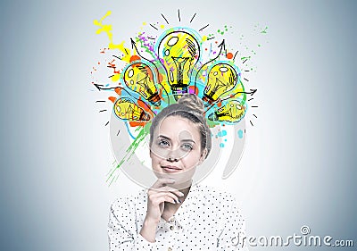 Smiling young woman dreaming, good idea Stock Photo