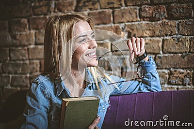 Smiling young woman have her relax time. Stock Photo