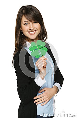Woman holding shamrock leaf Stock Photo