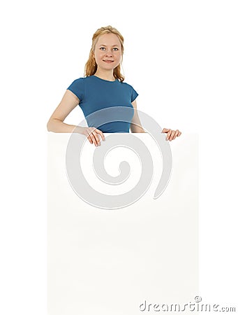 Smiling young women behind a blank banner ad Stock Photo