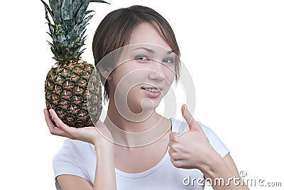 Smilling girl with pinaple showing ok Stock Photo