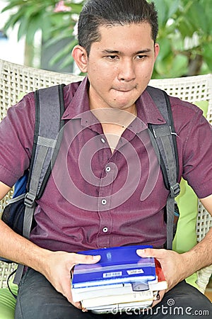 Smirking Youthful Filipino Boy Student Stock Photo