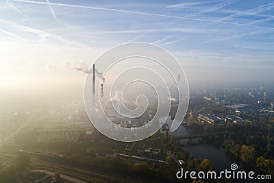 Aerial view of the smog over the city in the morning, smoking chimneys of the CHP plant and the city`s buildings - Wroclaw, Poland Stock Photo