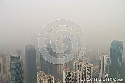 smoggy day, with view of bustling cityscape and towering skyscrapers Stock Photo