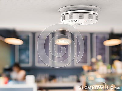 Smoke detector on ceiling Stock Photo